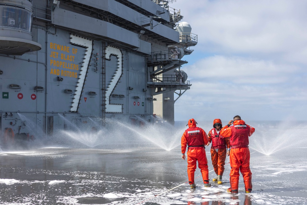 Abraham Lincoln conducts flight deck AFFF sprinkler tests