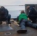 Abraham Lincoln Sailors participate in a live-fire exercise