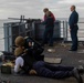 Abraham Lincoln Sailors participate in a live-fire exercise