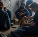 Abraham Lincoln Sailors participate in a live-fire exercise