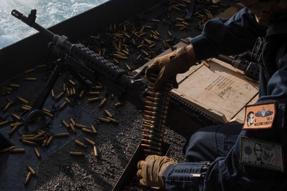 Abraham Lincoln Sailors participate in a live-fire exercise