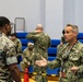 Service members and residents participate in an Emergency Evacuation Program exercise