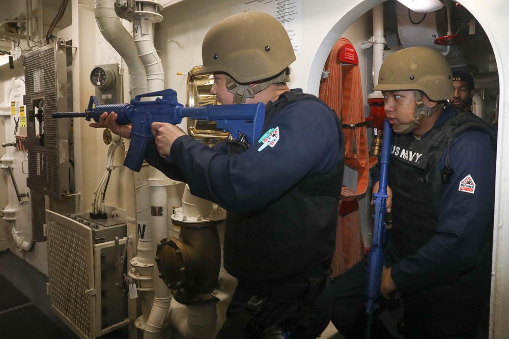 Sailors aboard the USS Rafael Peralta (DDG 115) conduct training before conducting active shooter drills in the South China Sea