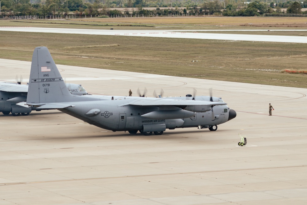 Seven C-130 Hercules aircraft formation