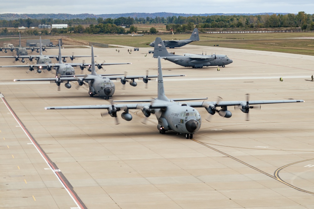 Seven C-130 Hercules aircraft formation