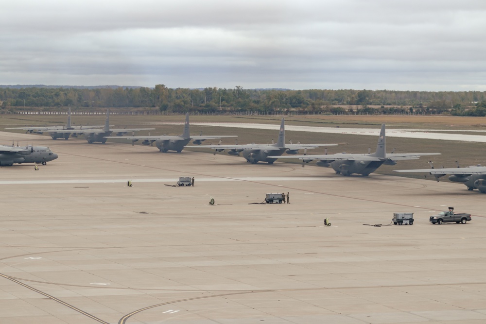 Seven C-130 Hercules aircraft formation