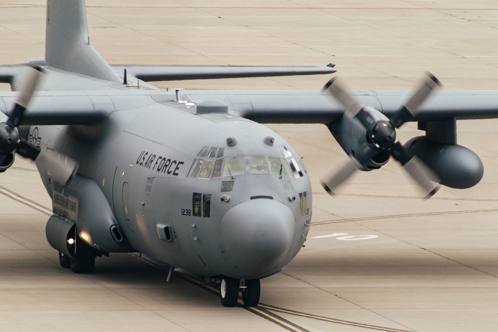 Seven C-130 Hercules aircraft formation