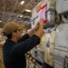 U.S. Navy Sailor Preps Material For Offload