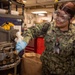 U.S. Navy Sailor Cleans Turret Punch