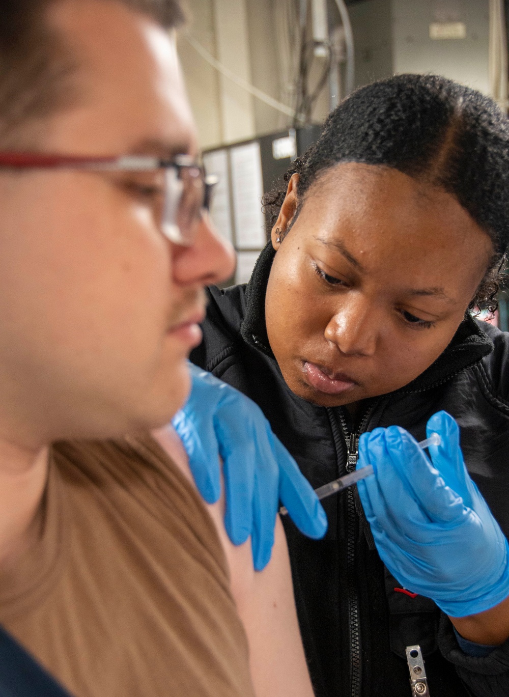 U.S. Navy Sailor Receive Flu Shots