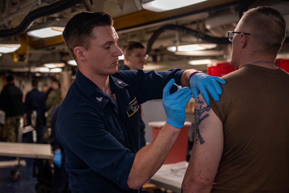 U.S. Navy Sailor Administers Flu Shots