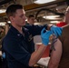 U.S. Navy Sailor Administers Flu Shots