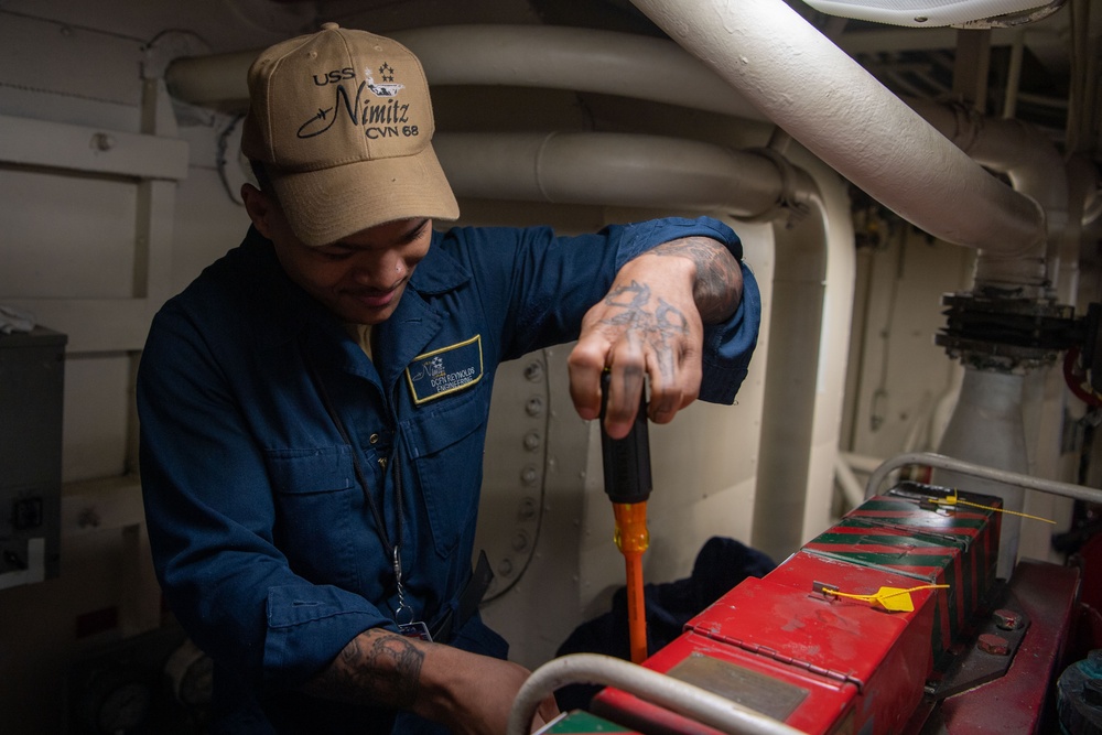 Sailor Works On Equipment