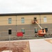 Construction operations of $11.96 million transient training brigade headquarters at Fort McCoy