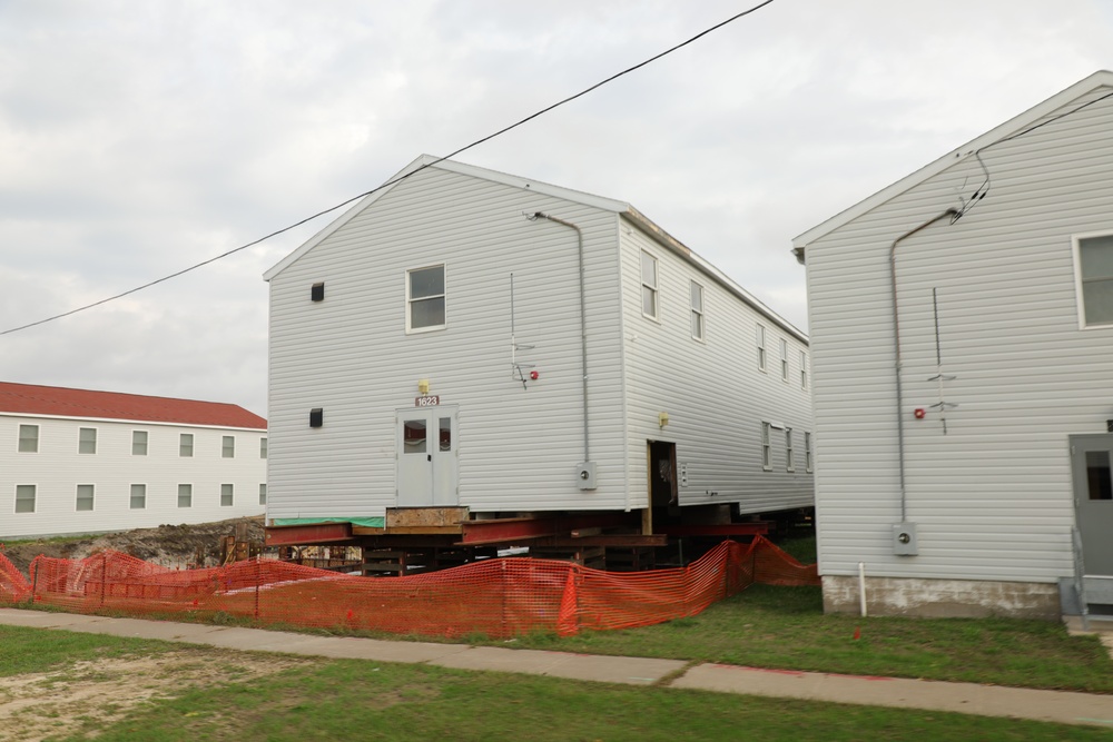 Work to build new foundations for relocated World War II-era barracks continues at Fort McCoy