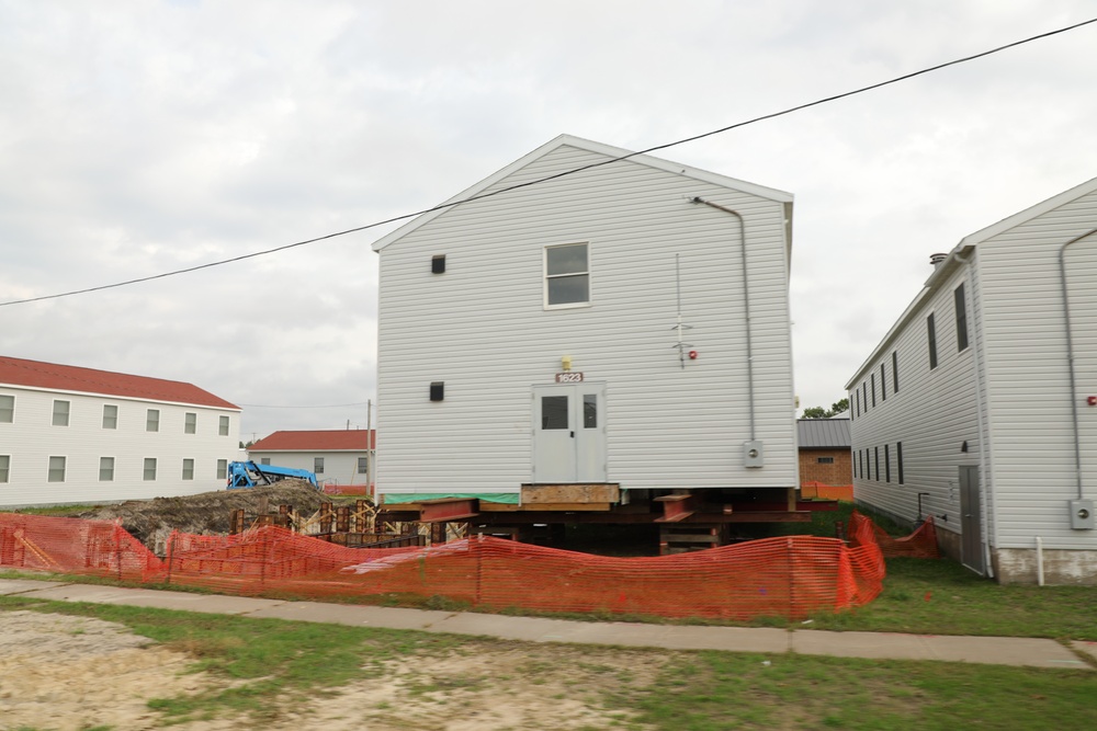 Work to build new foundations for relocated World War II-era barracks continues at Fort McCoy