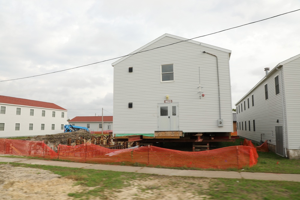 Work to build new foundations for relocated World War II-era barracks continues at Fort McCoy