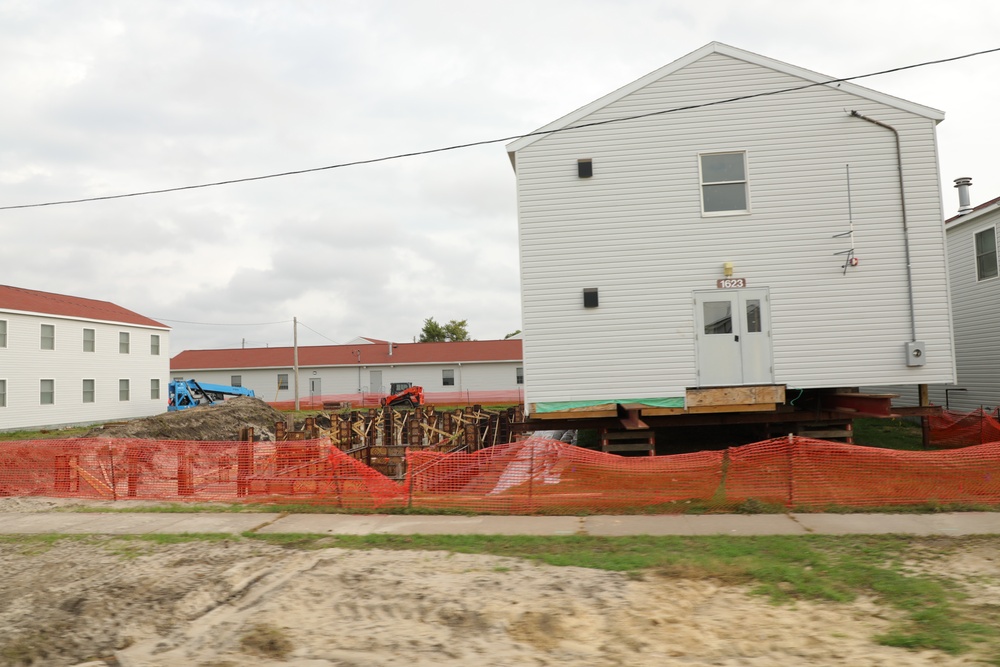 Work to build new foundations for relocated World War II-era barracks continues at Fort McCoy