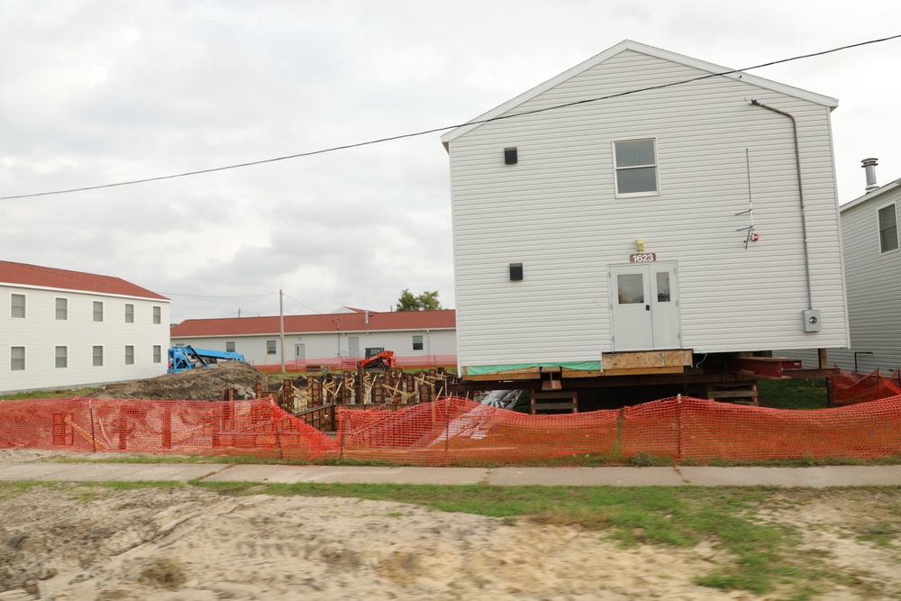 Work to build new foundations for relocated World War II-era barracks continues at Fort McCoy