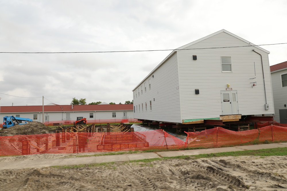 Work to build new foundations for relocated World War II-era barracks continues at Fort McCoy