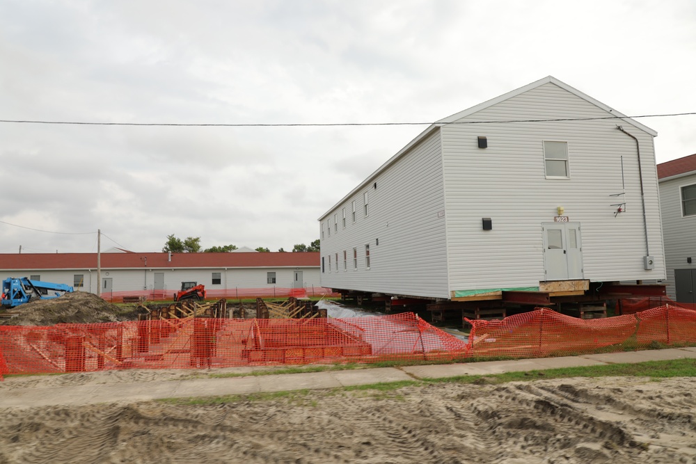 Work to build new foundations for relocated World War II-era barracks continues at Fort McCoy