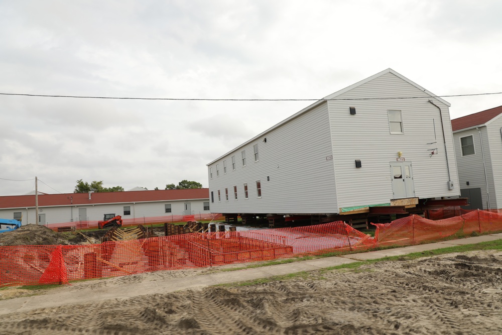 Work to build new foundations for relocated World War II-era barracks continues at Fort McCoy