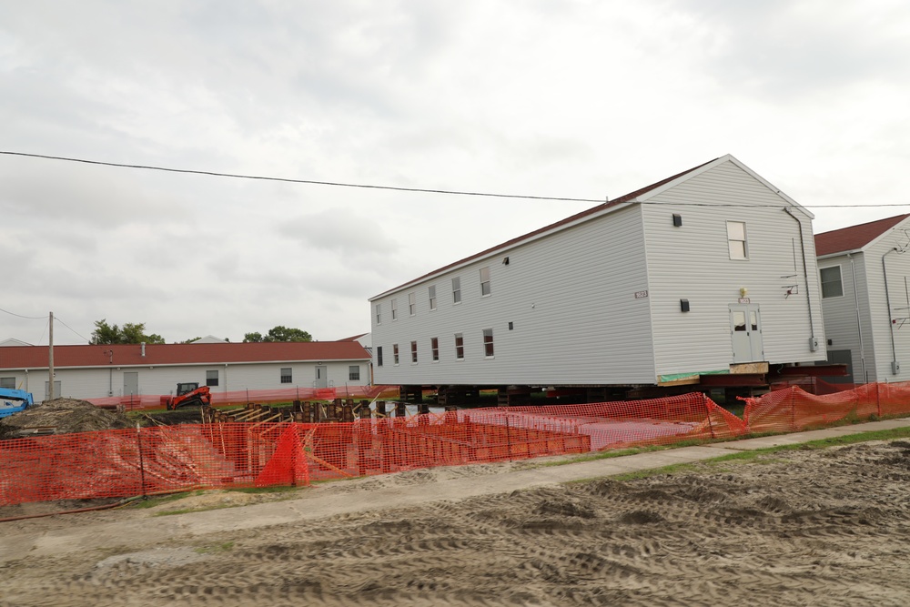 Work to build new foundations for relocated World War II-era barracks continues at Fort McCoy