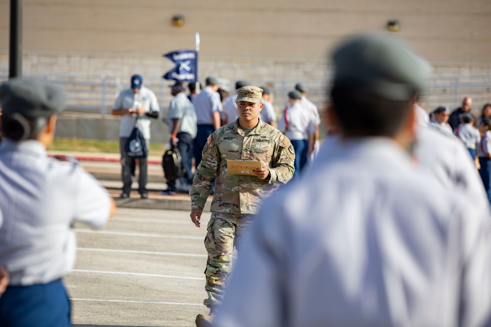 ARSOUTH, 410th CSB, and ARNORTH NCOs support local JROTC during drill competition