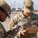 ARSOUTH, 410th CSB, and ARNORTH NCOs support local JROTC during drill competition