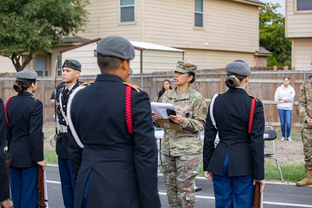 ARSOUTH, 410th CSB, and ARNORTH NCOs support local JROTC during drill competition