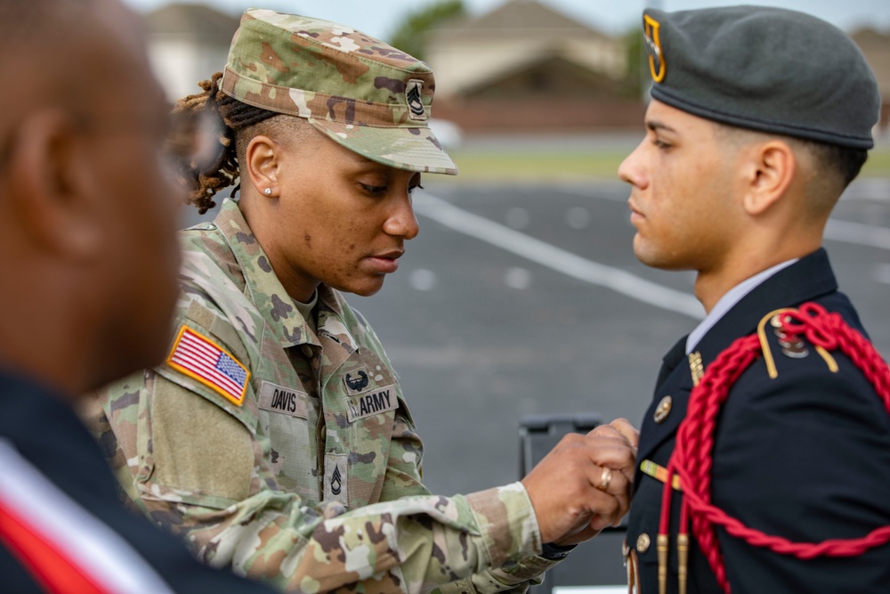 ARSOUTH, 410th CSB, and ARNORTH NCOs support local JROTC during drill competition