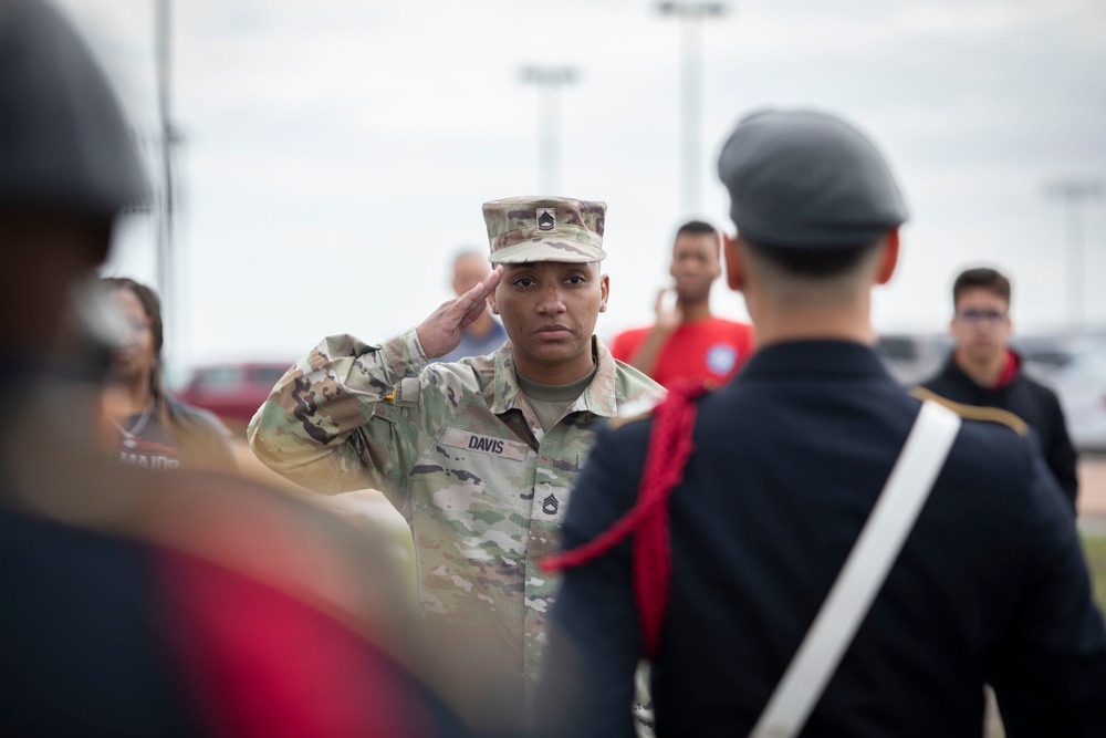 ARSOUTH, 410th CSB, and ARNORTH NCOs support local JROTC during drill competition