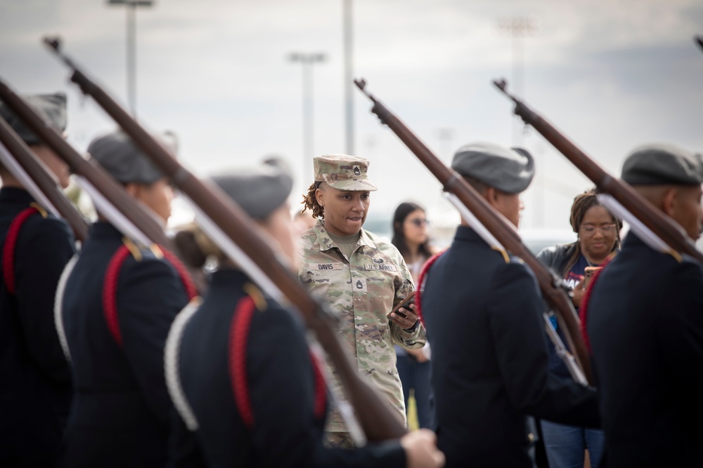 ARSOUTH, 410th CSB, and ARNORTH NCOs support local JROTC during drill competition