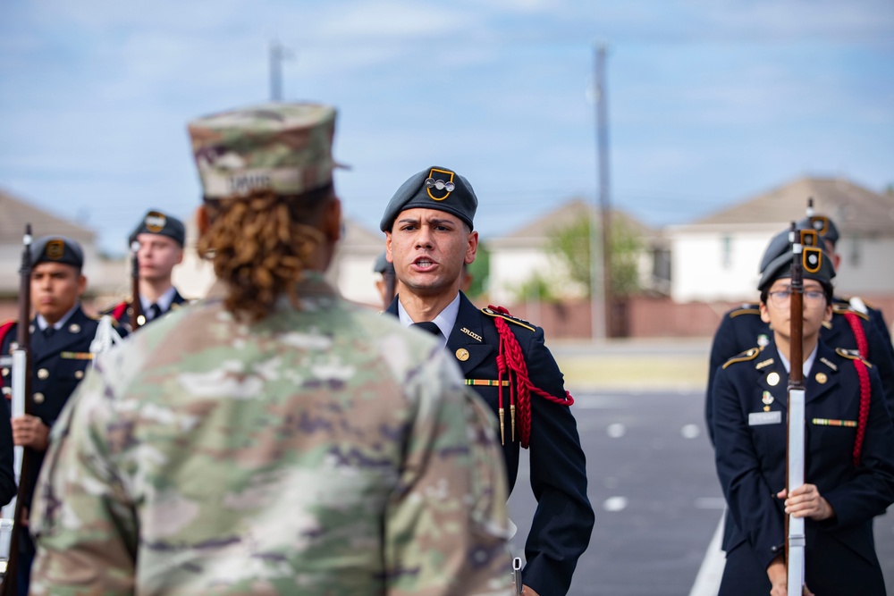 ARSOUTH, 410th CSB, and ARNORTH NCOs support local JROTC during drill competition