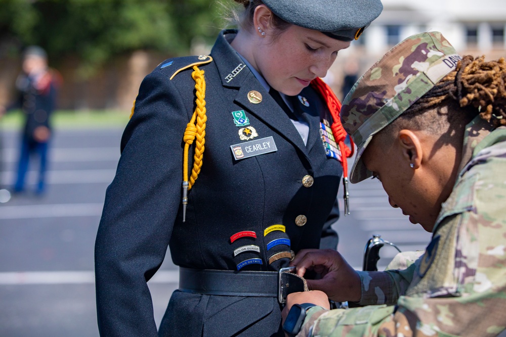 ARSOUTH, 410th CSB, and ARNORTH NCOs support local JROTC during drill competition