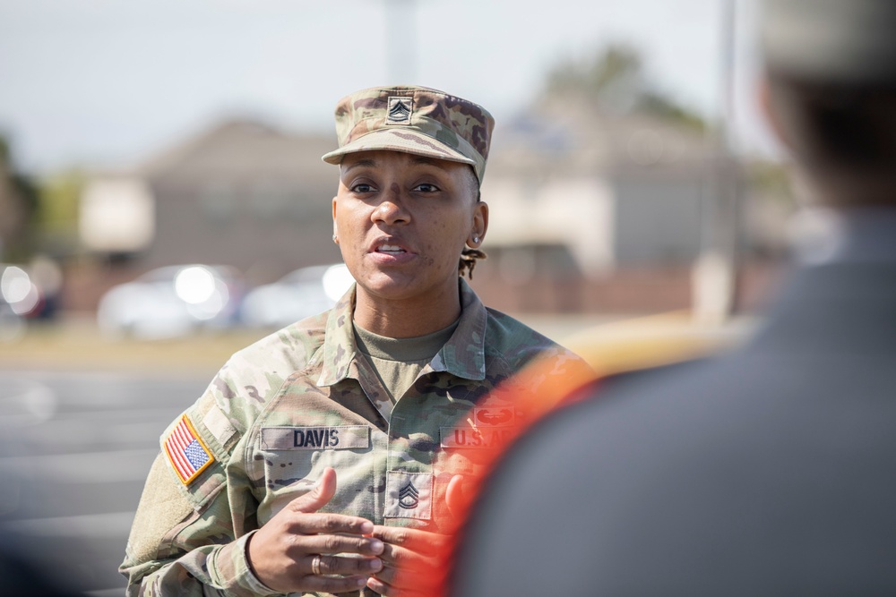 ARSOUTH, 410th CSB, and ARNORTH NCOs support local JROTC during drill competition