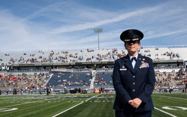 Col. Catherine M. Grush, Commander, 152nd Airlift Wing honored at University of Nevada, Reno vs. University of Nevada, Las Vegas rival game