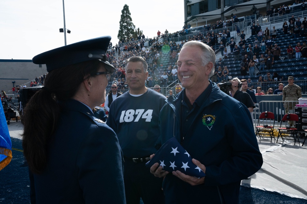 Col. Catherine M. Grush, 152nd Airlift Wing Commander, honored at University of Nevada, Reno vs. University of Nevada, Las Vegas rival game