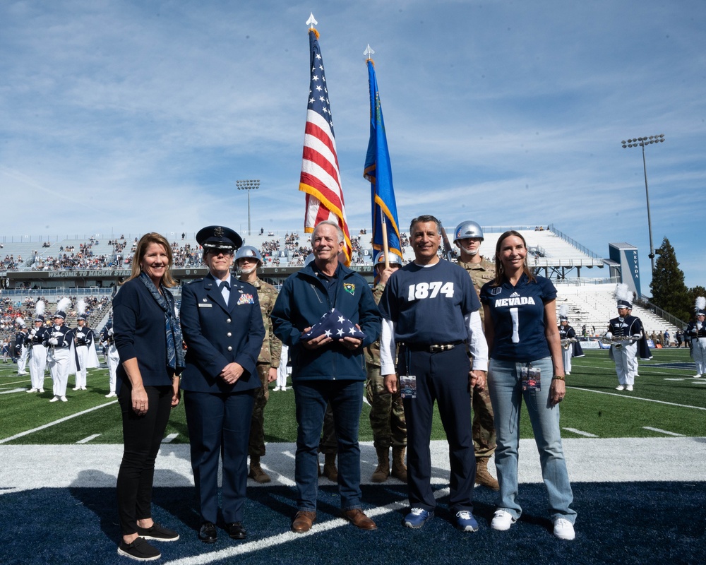 Col. Catherine M. Grush, 152nd Airlift Wing Commander, honored at University of Nevada, Reno vs. University of Nevada, Las Vegas rival game