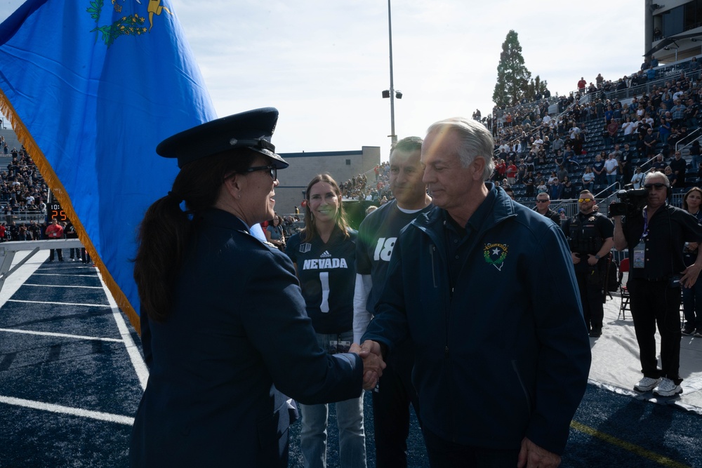 Col. Catherine M. Grush, 152nd Airlift Wing Commander, honored at University of Nevada, Reno vs. University of Nevada, Las Vegas rival game