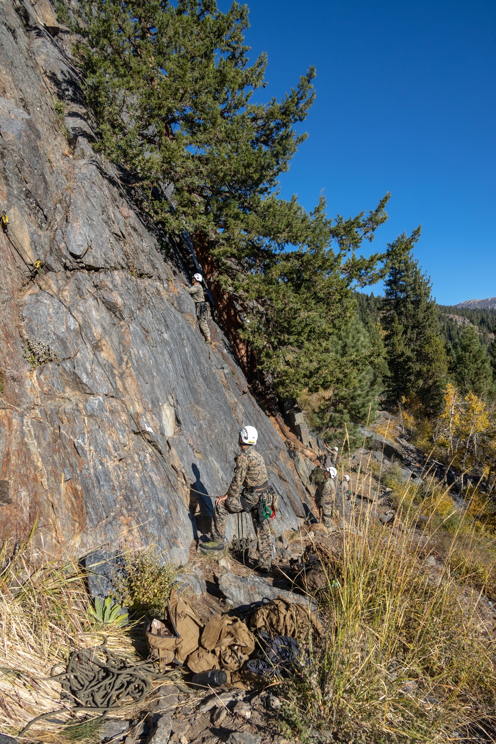 Marines with the Mountain Leaders Course climb and rappel down ‘Big Face’ during MTX 1-24