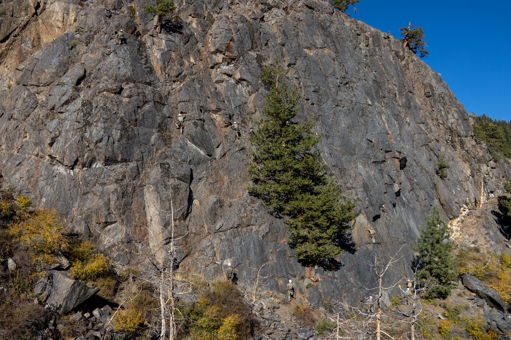 Marines with the Mountain Leaders Course climb and rappel down ‘Big Face’ during MTX 1-24