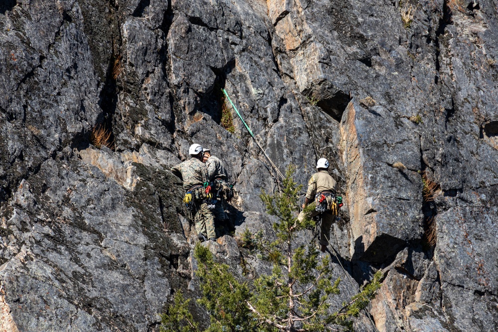 Marines with the Mountain Leaders Course climb and rappel down ‘Big Face’ during MTX 1-24