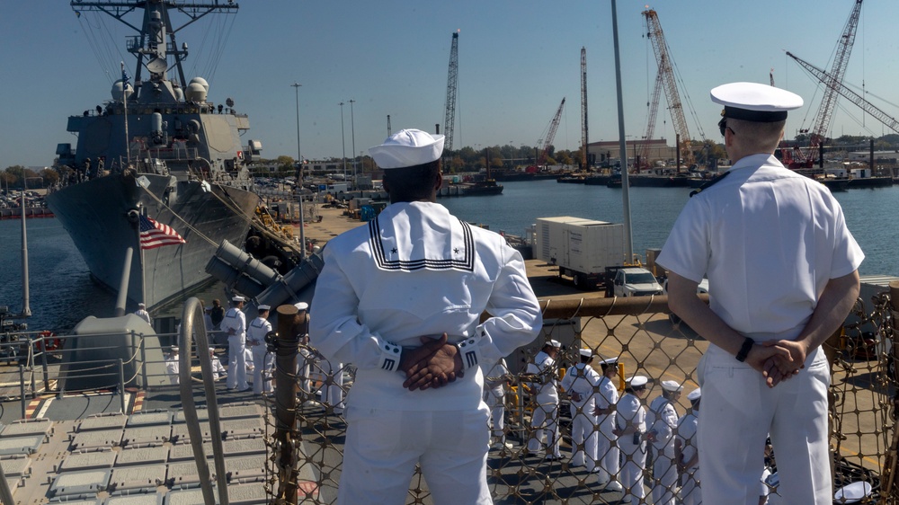 U.S. Navy Sailors man the Rails