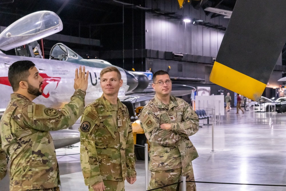 The fifth Cohort of Project Arc technicians assemble at the U.S. Air Force Museum in Dayton, Ohio