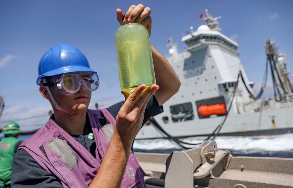 USS Dewey (DDG 105) Conducts Underway Replenishment with Royal Canadian Navy in South China Sea