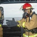 USS Ronald Reagan (CVN 76) Sailors simulate firefighting during general quarters drill