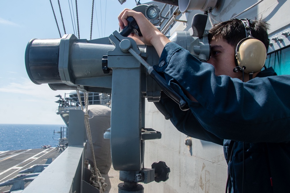 USS Ronald Reagan (CVN 76) Sailors stand lookout watch