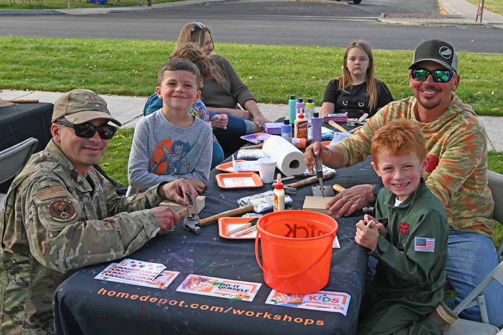 Kingsley airmen and their families pieced together wood projects during the Fall Festival.