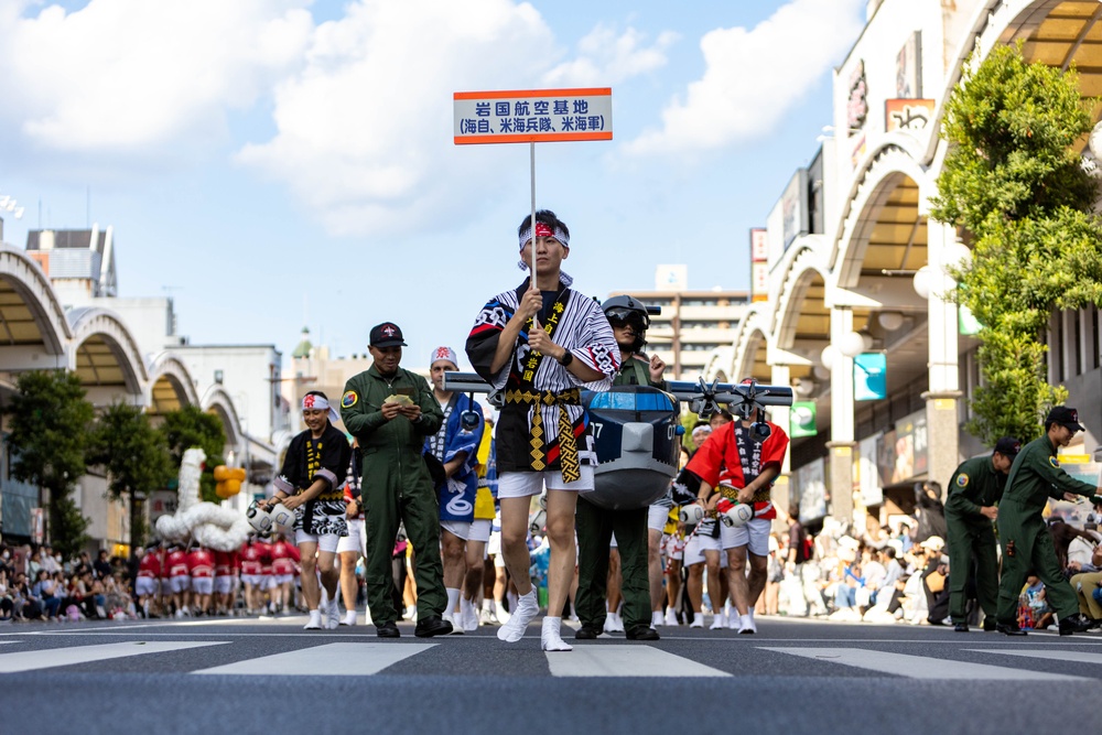 Coming Together - U.S. service members with Marine Corps Air Station Iwakuni participate in Iwakuni Matsuri Festival and Parade